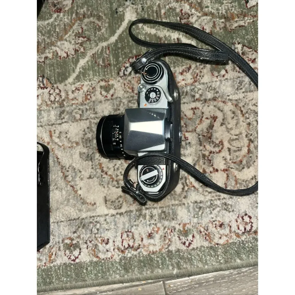Vintage Honeywell Pentax 35 Mm Camera Features A Classic Silver And Black Finish